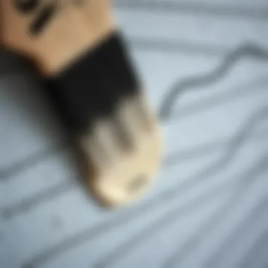 Close-up of acrylic paint application on a textured surface