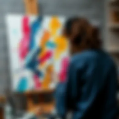 An artist painting with acrylics on canvas