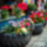 Recycled tire flower pot displaying vibrant flowers