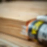Removing adhesive from a wooden surface