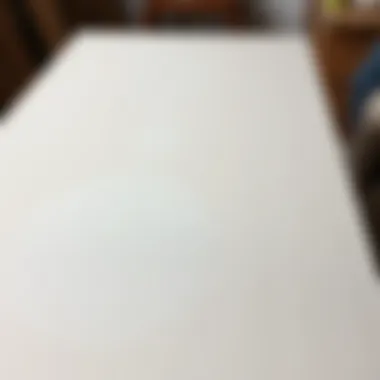 Smoothly sanded surface of a furniture piece awaiting paint application