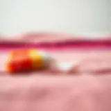 Removing adhesive from fabric surface