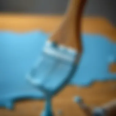 A close-up of a paint brush dipped in water-based paint